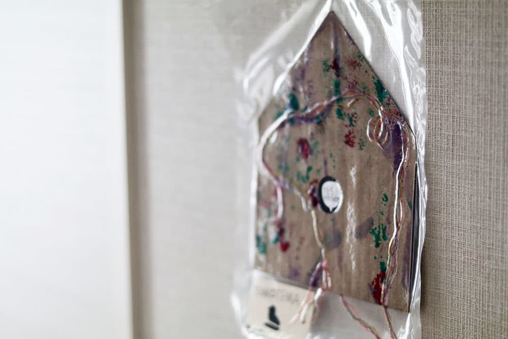 KOMONESTさんの真空パックされた封筒